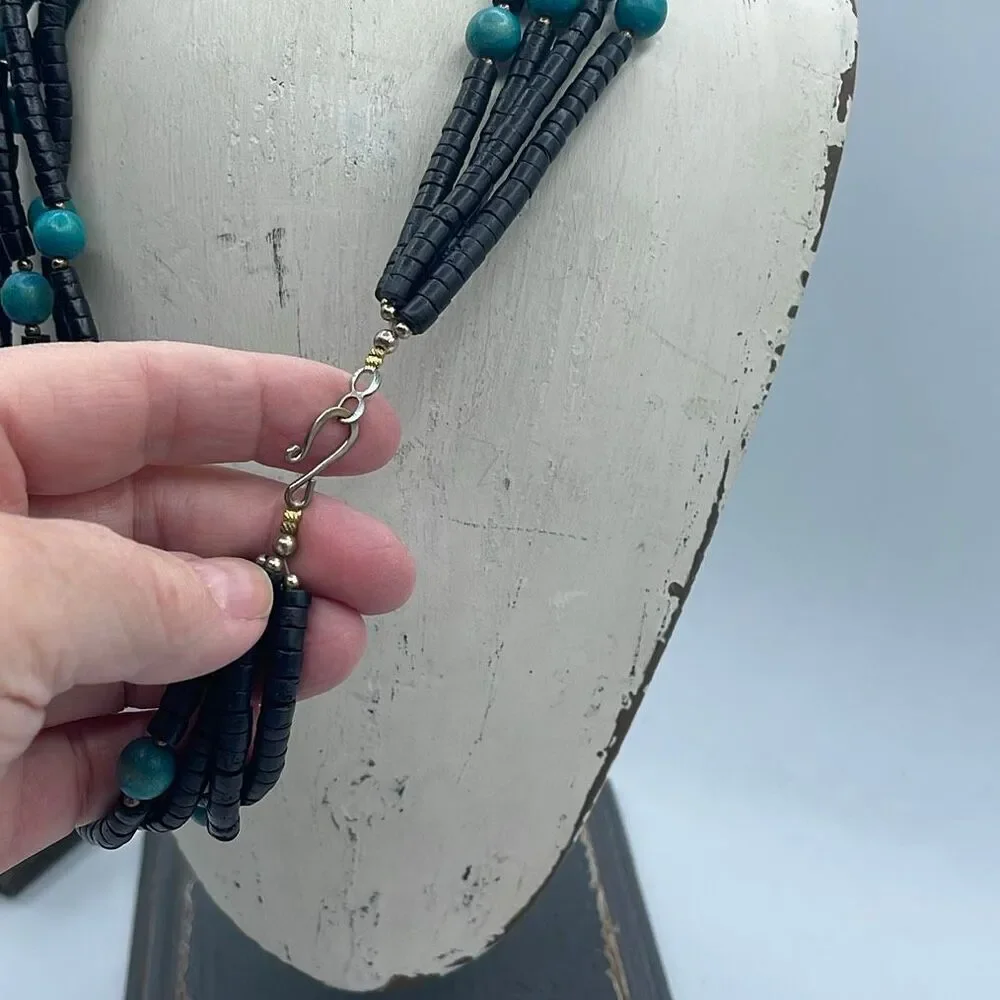 Vintage 4 strand wooden beaded boho festival necklace.